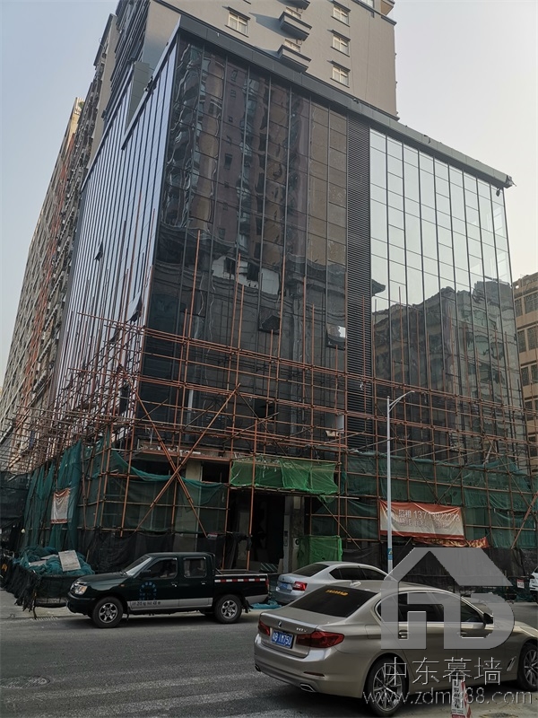 為什么現(xiàn)代建筑用玻璃幕墻？